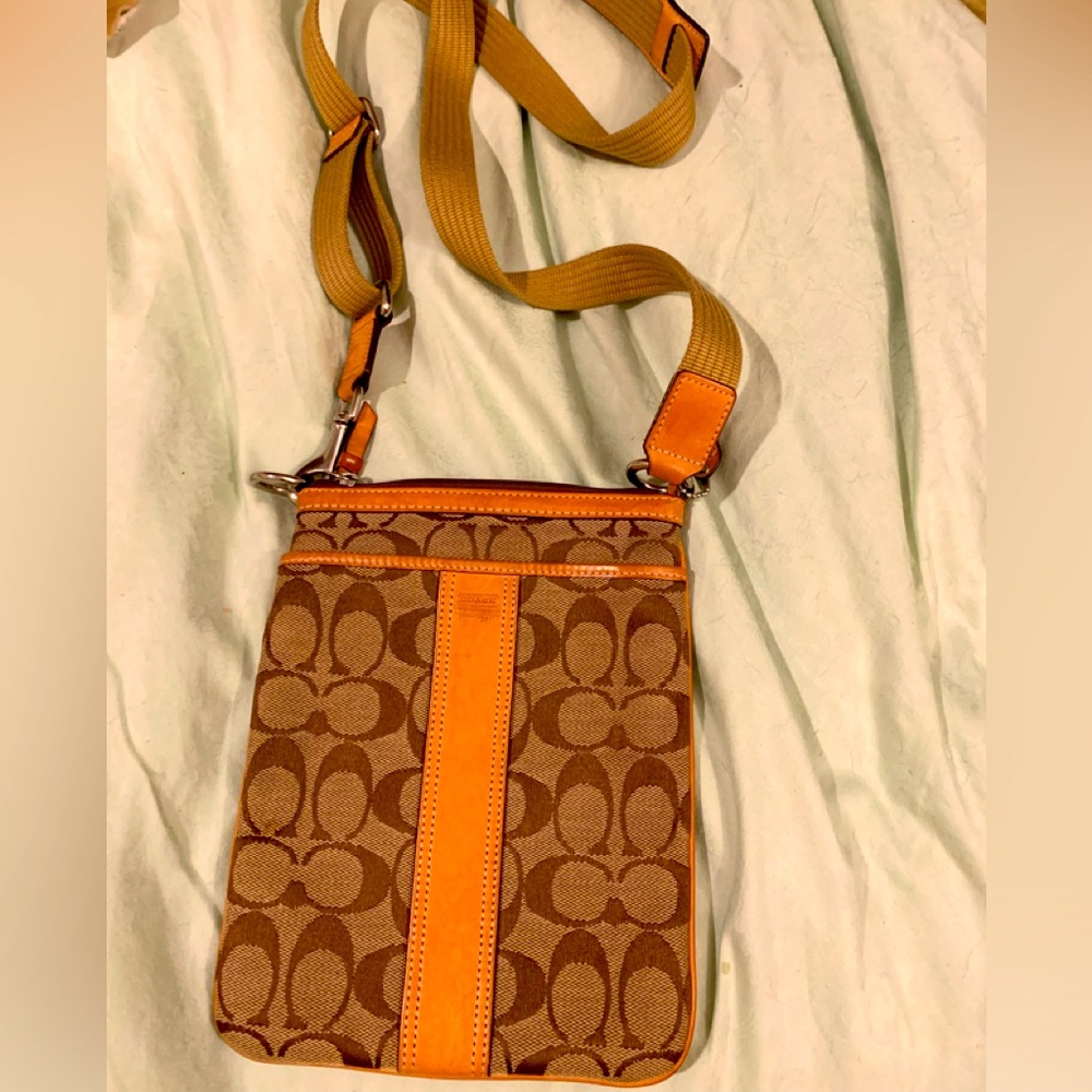 Really good condition funny , waist belted travel authentic Coach bag.Must have!